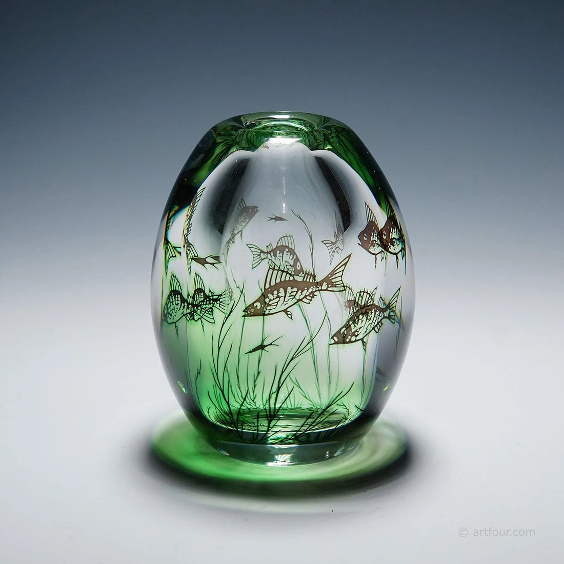 Vintage Fish Graal Vase by Edward Hald for Orrefors, Sweden 1963: A vintage vase of the Graal series designed by Edward Hald for Orrefors Sweden in 1938. Clear and green glass decorated with underwater flora and fishes, overlayed with a thick clear glass layer. This