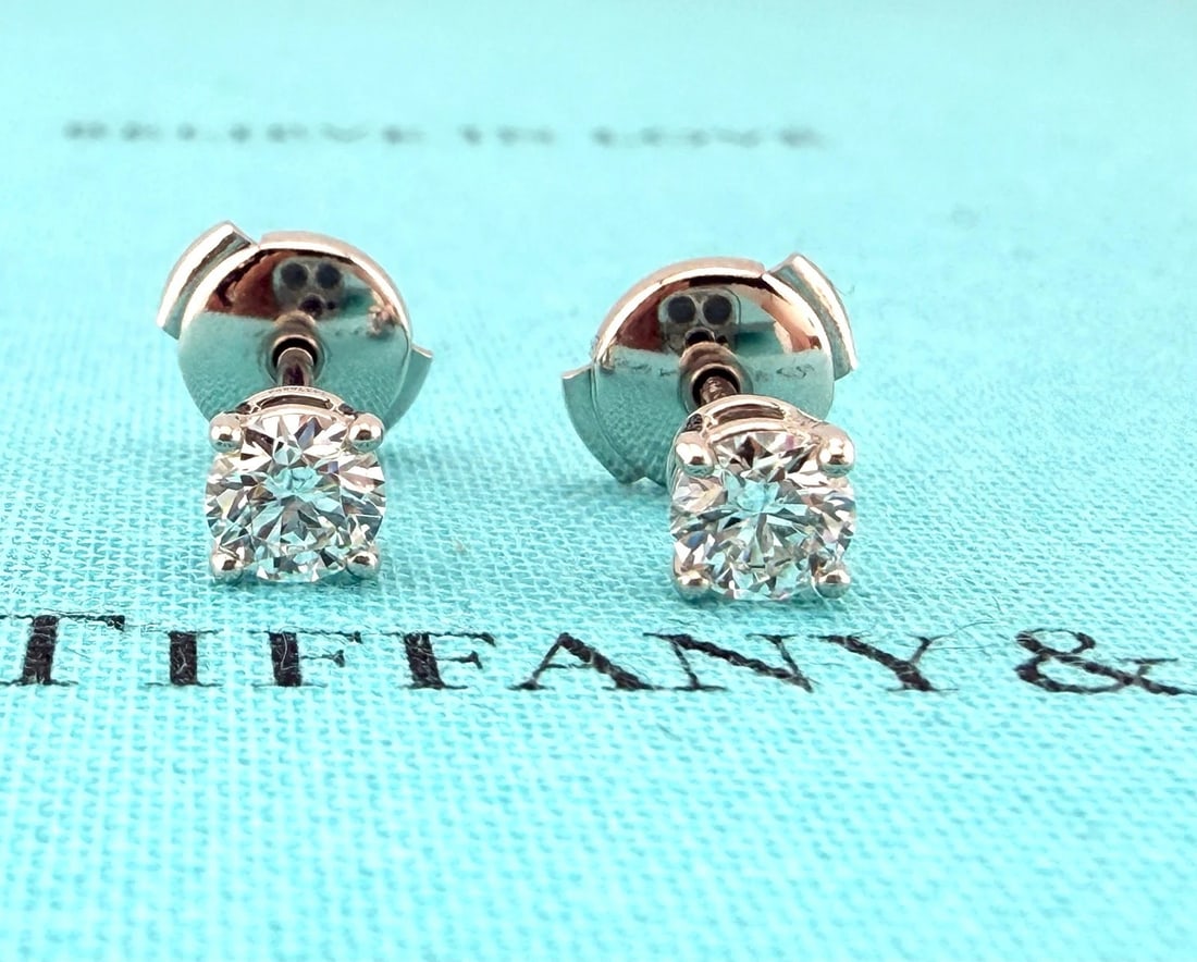 Tiffany & Co Platinum Round Diamond Stud Earrings 0.77 tcw F VVS2 Papers Box: Condition: Pre-owned - Good,Materials sourced from: United States,Country of Origin: United States,Number of Diamonds: 2,Main Stone Creation: Natural,Shape: Round,Closure: Screw Back,Signed: Yes,Cut G