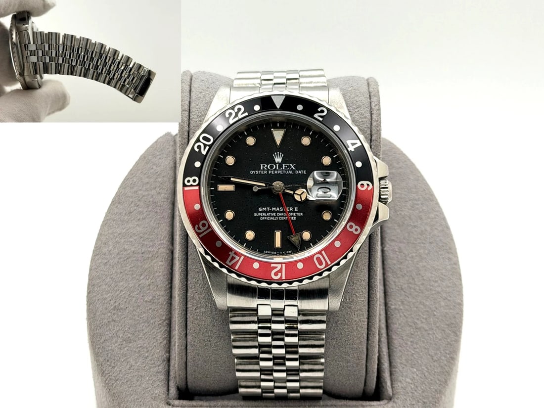 Rolex GMT Master II Fat Lady Coke 16760 40mm Black Dial Red Black Bezel Steel: Style Number: 16760Serial: 9846***Year: 1987 Model: Rolex GMT Master II 'Fat Lady' Case Material: Stainless Steel Band: Stainless Steel Bezel: Coke - Black & Red Dial: Black Crystal: Sapphire