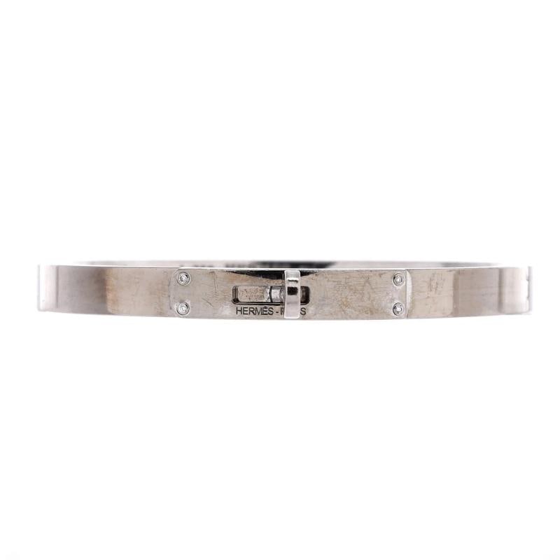Hermes Kelly Bracelet 18K White Gold with 4 Diamonds Small: Measurements: Circumference: 6.20 ", Width: 5.55 mm . Condition: Pre-owned - Good,Brand: Hermes,Main Stone: Diamond,Metal: 18K White Gold,Metal Purity: 18K,Style: Bracelet,Type: Bracelet,Color: White
