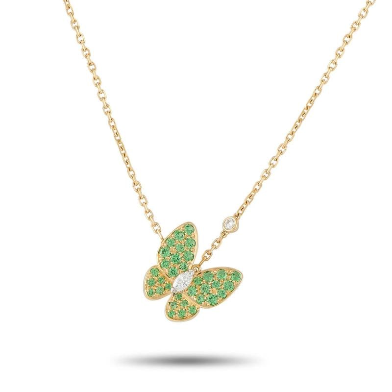 Van Cleef & Arpels Two Butterfly 18K Yellow Gold Diamond and Sapphire Necklace: Condition: Pre-owned - Good: This item has been gently used but is in good condition. It might have a few signs of wear, like light scratches or tarnishing. All imperfections should be shown and