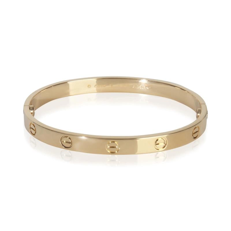 Cartier Yellow Gold Love Bracelet: Condition: Pre-owned - Good,Item Length: 18 cm,Country of Origin: France,Clasp/Buckle Type: Screw,With Original Box/Packaging: Yes,Side Stone Type: No Stone,Metal Purity: 18k,With Papers: No,Gross Wei