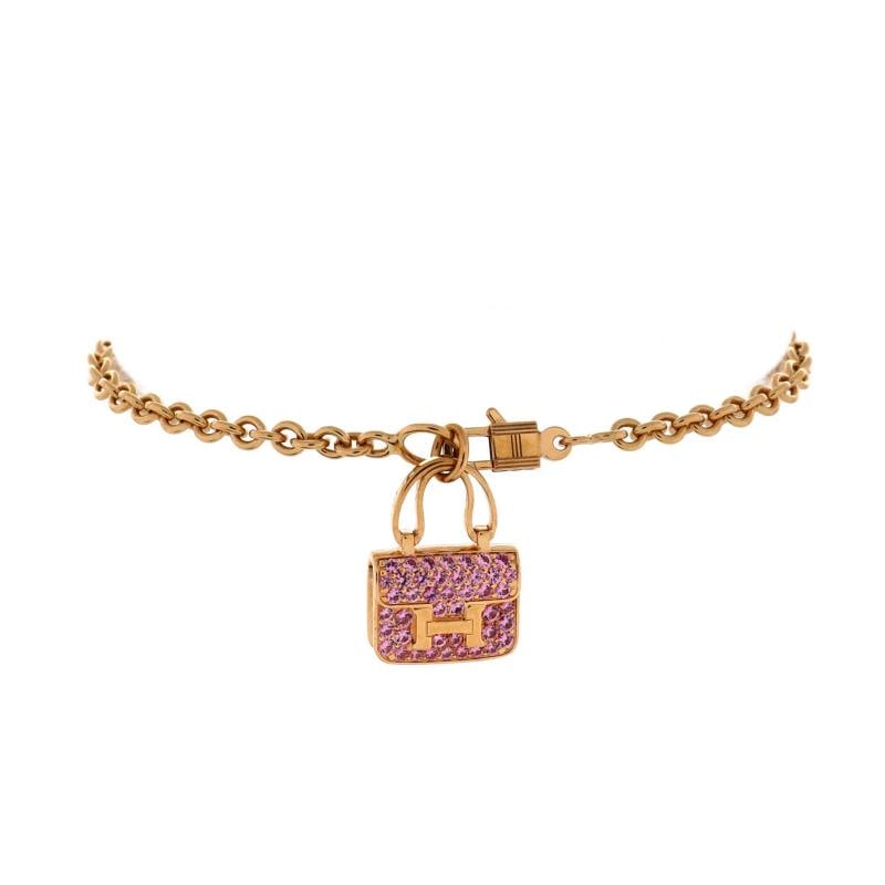 Hermes Amulettes Constance Bracelet 18K Rose Gold with Pink Sapphires: Condition: Pre-owned - Good,Brand: Hermes,Main Stone: Unknown,Metal: 18K Rose Gold,Metal Purity: 18K,Style: Bracelet,Type: Bracelet,Color: Rose Gold,Material: 18K Rose Gold, Sapphire Estimated Retail