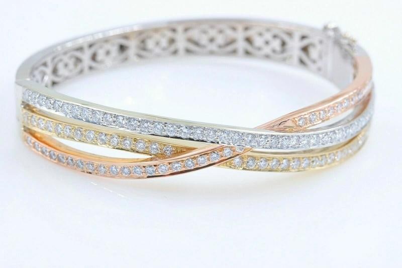 Tri-Color Round Diamond Bangle Bracelet 14k White Yellow Rose Gold 2.00 tcw: Style: Tri-Color Bangle Bracelet Metal: 14k White Yellow Rose Gold Size: Small Width: 10 MM at widest point Measurements: 2.25 X 2 inches - 5.75 inches inside Total Carat Weight: 2.00 tcw 