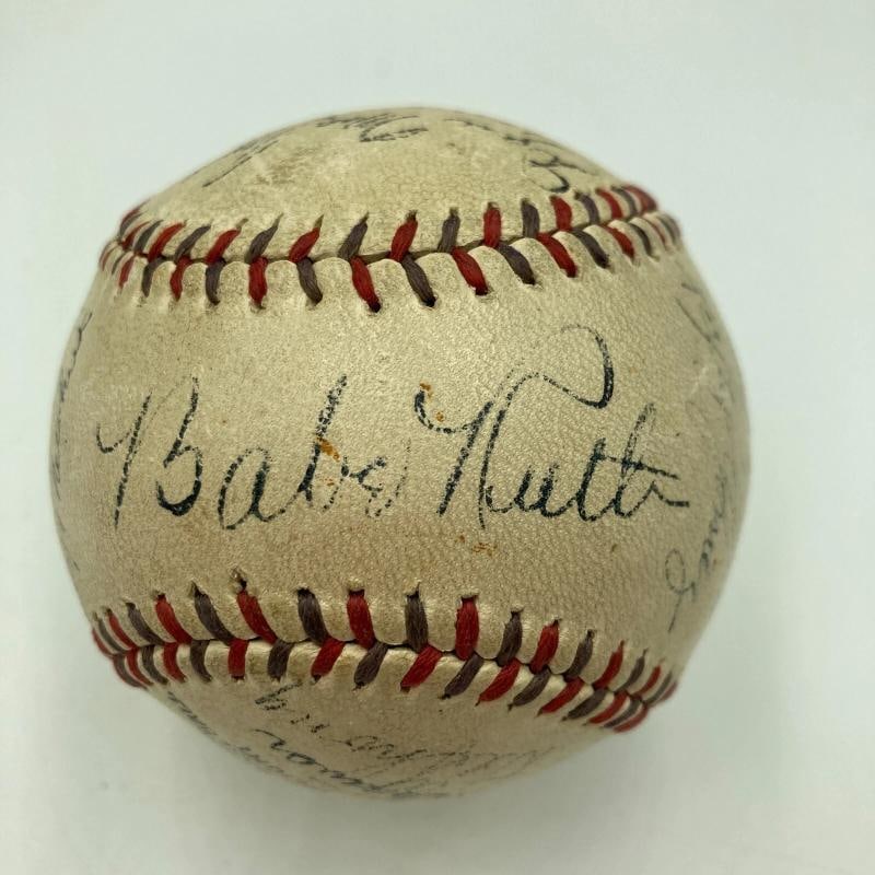 Babe Ruth & Lou Gehrig 1934 New York Yankees Team Signed Baseball JSA COA: signed in black fountain pen by the following twenty-two members of the 1934 New York Yankees: Babe Ruth, Lou Gehrig, Tony Lazzeri, Sewell, Ruffing, Gomez, Broaca, Chapman, Van Atta, Heffner,