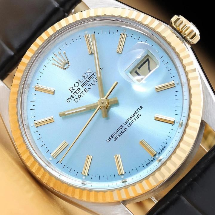 ROLEX MENS DATEJUST 16013 ICE BLUE DIAL 18K GOLD STEEL BLACK LEATHER BAND WATCH: This is an authentic Rolex Datejust 16013 watch with Rolex stick dial Ref., Rolex 18K yellow gold fluted bezel, and custom genuine black leather strap. Descriptions: Brand: Rolex Model: Datejust