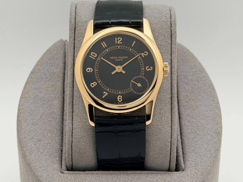 Patek Philippe Calatrava 5000J 33mm Black Dial 18K Yellow Gold (1 of 11)