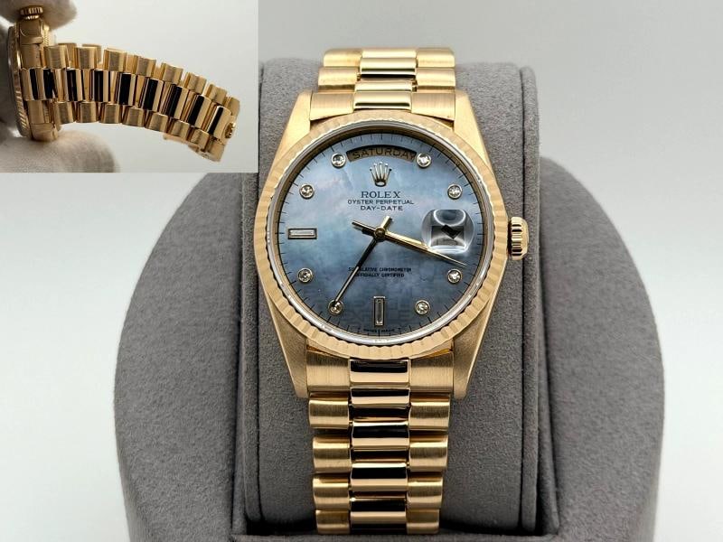 Rolex Day Date President 18348 36mm Blue Mother of Pearl Diamond Dial 18k Gold: Style Number: 18348 Serial: E34**** Year: 1990 Model: Rolex Day-Date President Case Material: 18k Yellow Gold Band: 18k Yellow Gold President Bezel: 18k Yellow Gold Fluted Dial: Factory Blue Mother of