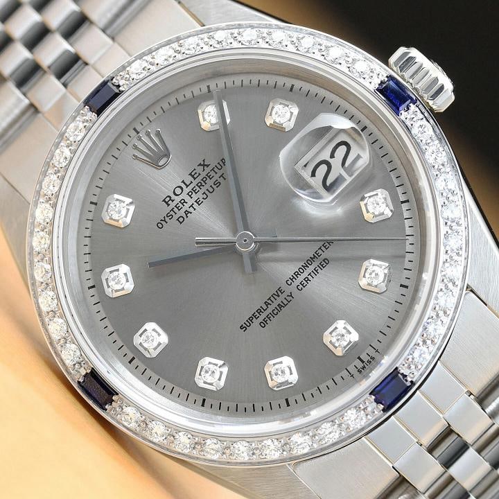 MENS ROLEX DATEJUST GRAY DIAL 18K WHITE GOLD DIAMOND SAPPHIRE WATCH + ROLEX BAND: Condition: Pre-owned - Good,Bezel Color: Silver,Max Wrist Size: 7.26-7.5 in,Number of Jewels: 26 Jewels,Indices: Diamond Markers, 12-Hour Dial, Multiple Hands,Bezel: Custom 18K White Gold Diamond & Sa