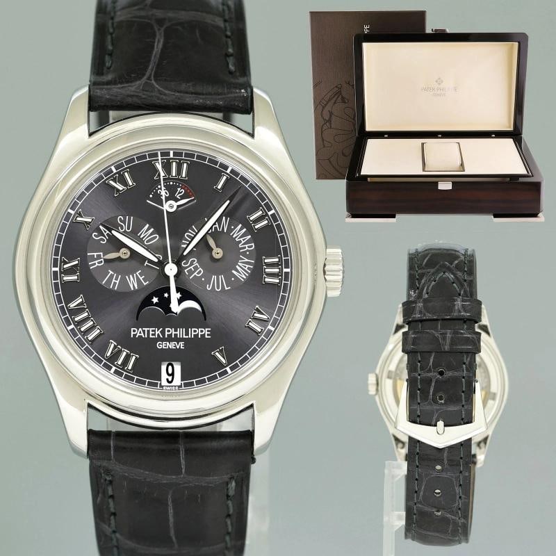 MINT Patek Philippe Platinum Annual Calendar Moonphase 5056P Grey Roman Watch: Brand Patek Philippe Model Annual Calendar Ref # 5056P Gender Men's Metal Platinum Case Size 37 MM Wrist Size Will fit up to a 7.50" inch wrist Movement Patek Philippe Self-winding Mechanical