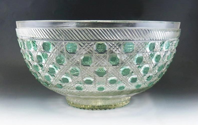 Antique 19th Century Bohemian Czech Cut Green to Clear Glass Punch Bowl: an antique, Bohemian cut to clear glass punch bowl made during the 1800s. The bowl is hand cut with octagonal green designs and latticework decoration. The bowl is very large and has a tall foot rim,