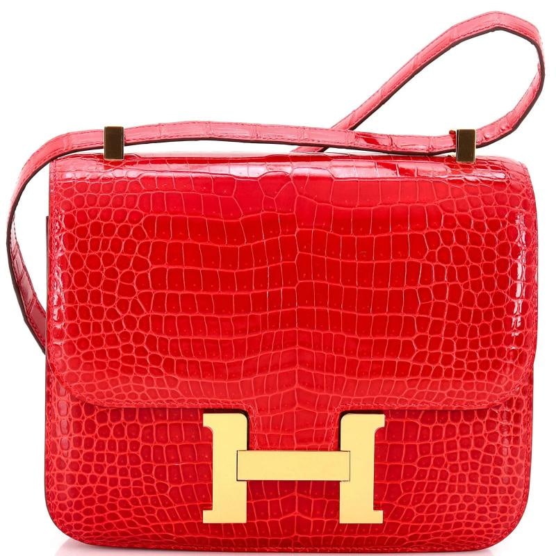 Hermes Constance Bag Shiny Porosus Crocodile 24: Accessories: Dust Bag Measurements: Height 8", Width 9", Depth 3". Condition: Pre-owned - Excellent,Brand: Hermes,Exterior Material: Crocodile, Exotic,Style: Shoulder Bags,Exterior Color: Red,Departme