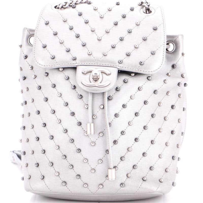 Chanel Stud Wars Backpack Studded Chevron Calfskin: Accessories: Dust Bag Measurements: Handle Drop 3.5", Height 8.5", Width 6.5", Depth 4.5", Strap Drop 12-13". Condition: Pre-owned - Good,Brand: Chanel,Exterior Material: Leather,Style: