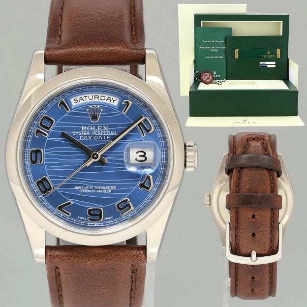 2012 PAPERS MINT Rolex President Day Date Blue Wave 118209 White Gold Oyster: Brand Rolex (Guaranteed Authentic) Model Day-Date President Reference Number 118209 Serial Number M Metal White Gold Case Size 36.00mm Wrist Size This watch will currently comfortably fit a wrist up
