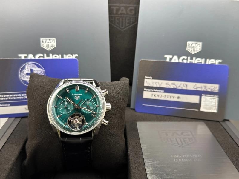 TAG Heuer Carrera Tourbillon CBS5011.FC6566 42mm Teal Green Dial Steel Box Paper: Style Number: CBS5011.FC6566 Serial: WTV**** Year: 2024 Model: TAG Heuer Carrera Chronograph Tourbillon Case Material: Stainless Steel Band: Black Leather Bezel: Stainless
