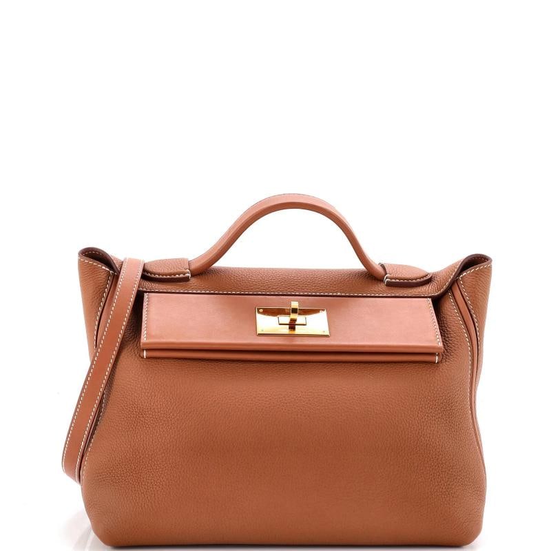 Hermes 24/24 Bag Togo with Swift 29: Condition: Pre-owned - Excellent,Brand: Hermes,Exterior Material: Leather,Style: Top Handle,Exterior Color: Brown,Department: Women,Size: 29,Accessories: Box, Dust Bag, With Strap Condition: Great.