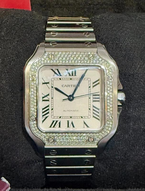 CARTIER MEDIUM SANTOS STAINLESS FACTORY DIAMOND BEZEL (2022) Ref. W4SA0005: Condition: Pre-owned - Excellent,Reference Number: W4SA0005,Bezel Color: Silver,Closure: Butterfly Clasp,Max Wrist Size: 6.76-7 in,Number of Jewels: 23 Jewels,Indices: Roman Numerals,Year Manufactured
