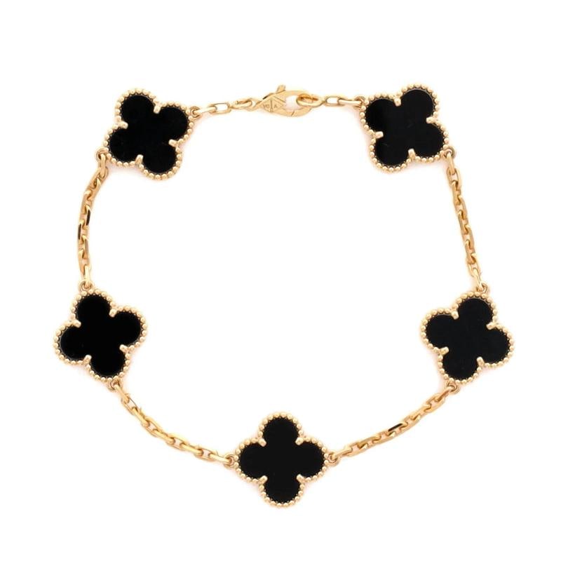 Van Cleef & Arpels Vintage Alhambra 5 Motifs Bracelet 18K Yellow Gold and Onyx: Measurements: Circumference: 7.50 ", Width: 14.90 mm . Condition: Pre-owned - Good,Brand: Van Cleef & Arpels,Main Stone: Onyx,Metal: 18K Yellow Gold,Metal Purity: 18K,Style: Bracelet,Type: Bracelet,Co