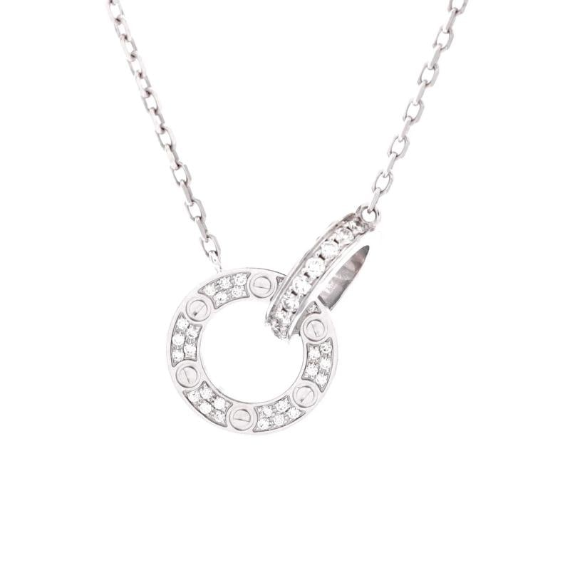 Cartier Love Interlocking Pave Necklace 18K White Gold and Diamonds: Measurements: Length: 14.75 - 16.0 ", Pendant Length: 0.75 ", Pendant Width: 2.65 mm . Condition: Pre-owned - Good,Brand: Cartier,Main Stone: Diamond,Metal: 18K White Gold,Metal Purity: 18K,Style: