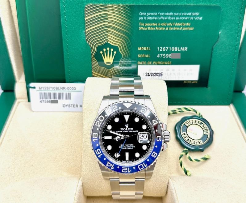 2025 Rolex GMT Master II Batman 126710BLNR 40mm Black and Blue Bezel Box Paper: Condition: Pre-owned - Excellent,Bezel Color: Black, Blue,Movement: Mechanical (Automatic),With Papers: Yes,Year Manufactured: 2025,Reference Number: 126710BLNR, 126710,Band/Strap: Rolex Oyster,Brand: