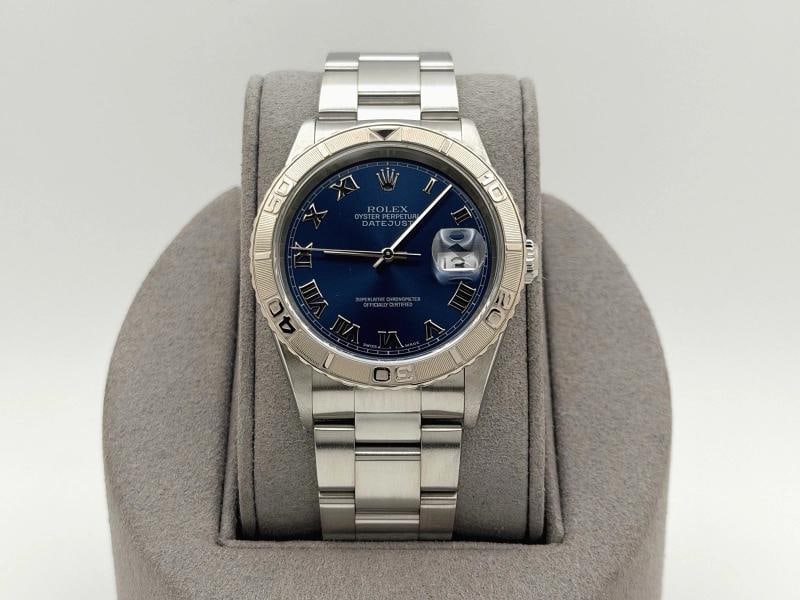 Rolex Datejust Thunderbird Turn O Graph 16264 36mm Blue Dial 18K Gold Steel: Condition: Pre-owned - Excellent,Bezel Color: Silver,Movement: Mechanical (Automatic),Indices: Roman Numerals,Year Manufactured: 2000-2009,Reference Number: 16264,Band/Strap: Rolex Oyster,Brand: Rolex