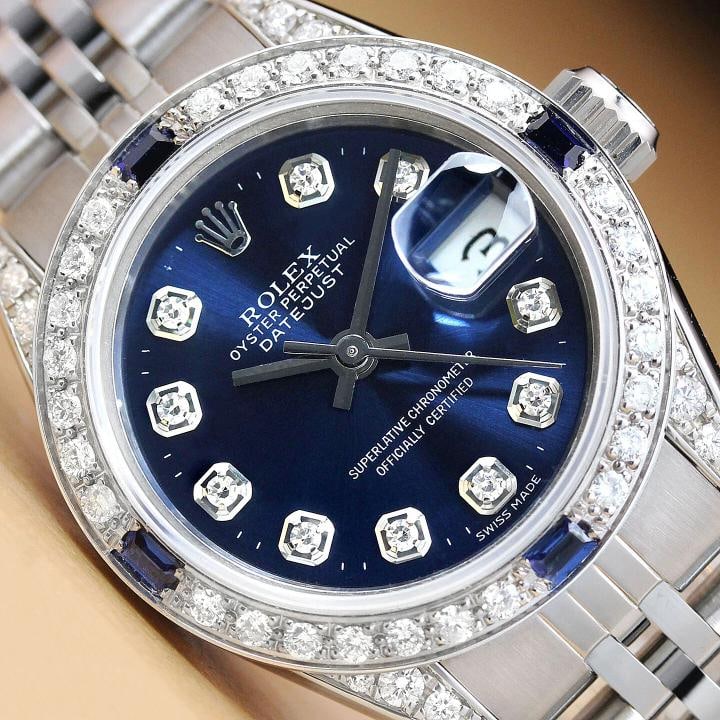 ROLEX LADIES DATEJUST 69174 BLUE DIAMOND SAPPHIRE 18K WHITE GOLD STEEL WATCH: Condition: Pre-owned - Good,Bezel Color: Silver,Max Wrist Size: 6.26-6.75 in,Number of Jewels: 29 Jewels,Indices: Diamond Markers, 12-Hour Dial,Band: Rolex Stainless Steel Jubilee Bracelet,Bezel: Cust