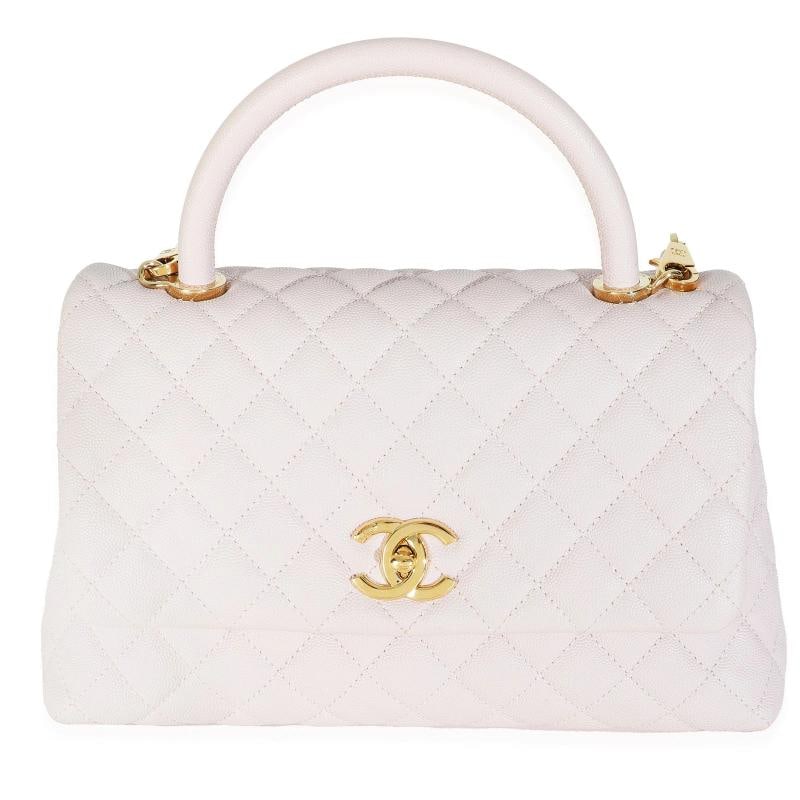 Chanel Light Pink Quilted Caviar Medium Coco Top Handle Handbag: Condition: Pre-owned - Good,Country of Origin: Italy,Dimensions: 11 x 7 x 4.5,Handbag Accessories: Authenticity Card;Removable Straps,Bag Width: 11 in,Bag Depth: 4.5 in,Bag Height: 7 in,Department: Un