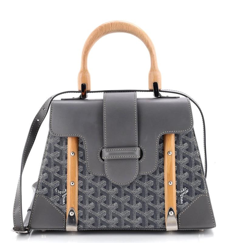 Goyard Saigon Top Handle Bag Coated Canvas with Leather PM: Accessories: With Strap Measurements: Handle Drop 3.5", Height 8", Width 10", Depth 4.5", Strap Drop 20-25". Condition: Pre-owned - Good,Brand: Goyard,Exterior Material: Canvas Coated, Leather,