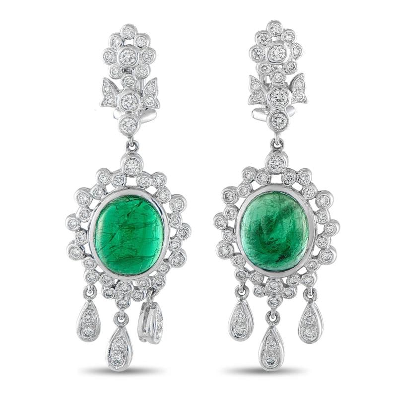 18K White Gold 1.10ct Diamond and Emerald Earrings: . The delicate 18K White Gold settings showcase sparkling Diamonds with a total weight of 1.10 carats. At the center, Emerald cabochons totaling 6.50 carats provide an elegant pop of color. Each