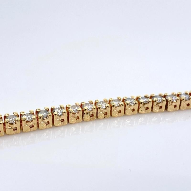 Round Brilliant Diamonds 14 kt Yellow Gold Tennis Bracelet - 10