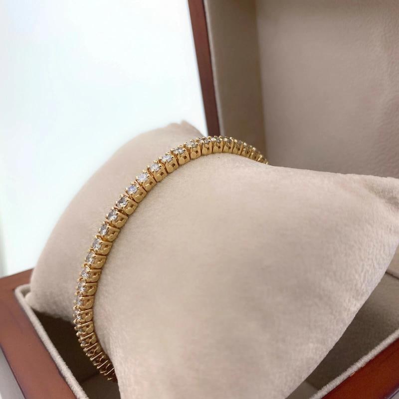 Round Brilliant Diamonds 14 kt Yellow Gold Tennis Bracelet - 9