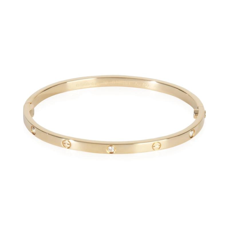 Cartier Yellow Gold Diamond Small Model Love Bracelet: Condition: Pre-owned,Shape: Round Brilliant,Item Length: 16 cm,Country of Origin: France,Clasp/Buckle Type: Screw,With Original Box/Packaging: Yes,With Papers: Yes,Side Stone Type: Diamond,Side Stone