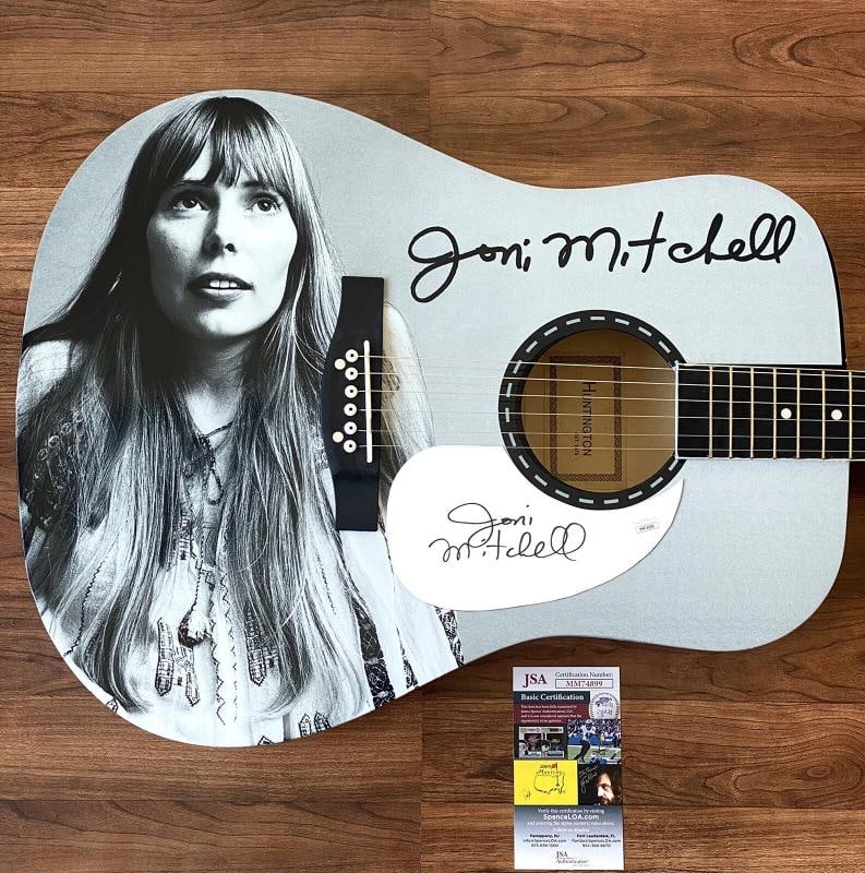 Joni Mitchell Signed Guitar Custom 1/1 Graphics! JSA COA: Signed: Yes,Industry: Music,Autograph Authentication: James Spence (JSA),Object Type: Guitar & Guitar Pick,Original/Reproduction: Original,Country of Origin: United States This Huntington acoustic gui