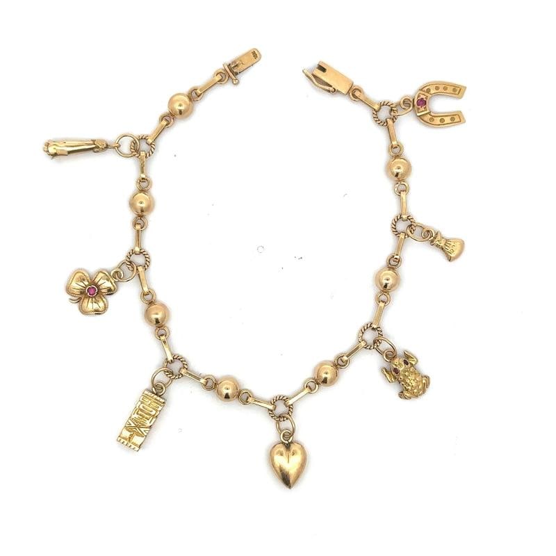 Vintage Charm Bracelet In 18K Yellow Gold: Condition: Pre-owned - Good,Brand: Unbranded,Type: Bracelet,Metal Purity: 18k,Closure: Box,Color: Yellow,Style: Chain, Charm,Base Metal: Gold,Metal: Yellow Gold,Item Length: 8,Main Stone: No