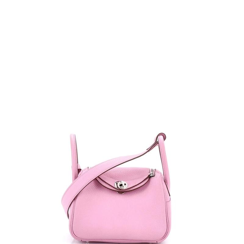 Hermes Lindy Bag Clemence Mini: Condition: Pre-owned - Good,Brand: Hermes,Exterior Material: Leather,Style: Cross Body Bags,Exterior Color: Pink,Department: Women,Size: Mini,Accessories: Dust Bag Condition: Very good. Exterior: mino