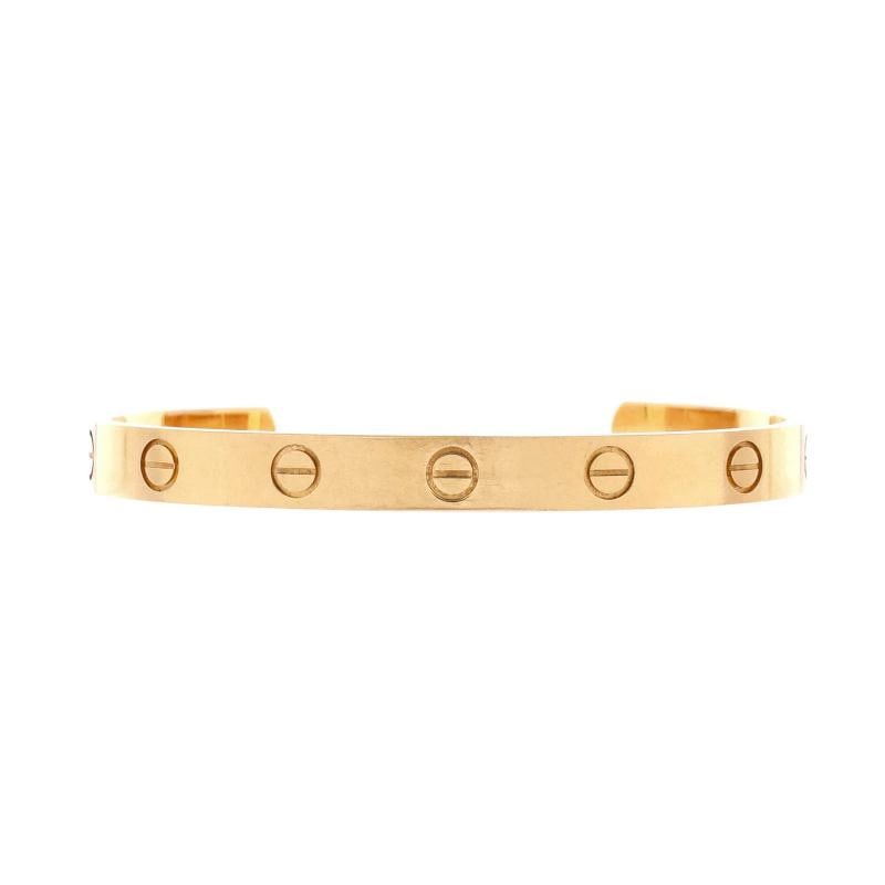 Cartier Love Cuff Bracelet 18K Yellow Gold: Condition: Pre-owned - Good,Brand: Cartier,Main Stone: Unknown,Metal: 18K Yellow Gold,Metal Purity: 18K,Style: Cuff,Type: Bracelet,Color: Yellow Gold,Material: 18K Yellow Gold Condition: Very good.