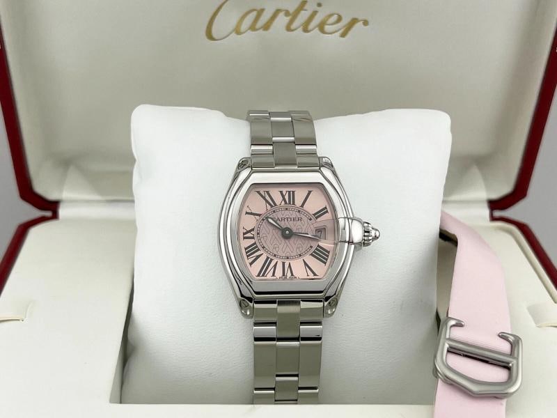 Cartier Ladies Roadster 2675 Pink Ribbon Breast Cancer Awareness Stainless Steel: Condition: Pre-owned - Good,Country of Origin: Switzerland,Bezel Color: Silver,Movement: Quartz,Seller Warranty: Yes,Indices: Roman Numerals,Reference Number: 2675,Band/Strap: Bracelet,Brand: Cartier,