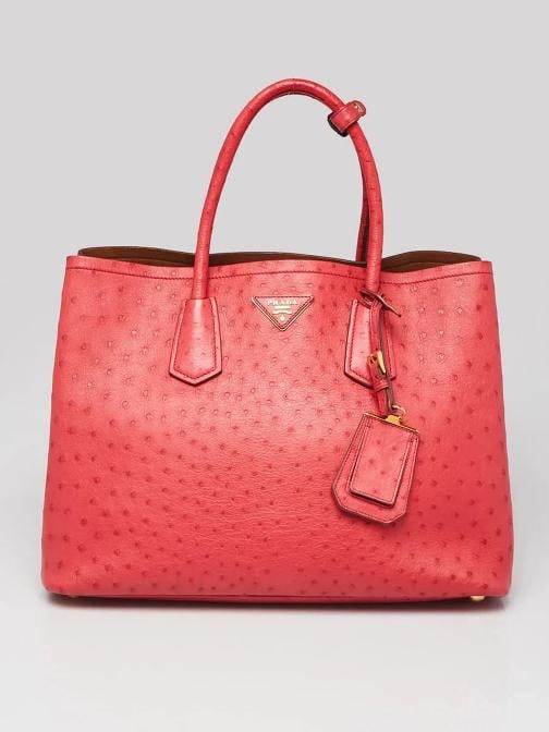 Prada Red Ostrich Leather Double Handle Tote Bag: Handle Drop 6 Measurements 14 L x 75 W x 105 H Condition Preowned GoodBrand PradaExterior Material OstrichStyle Everyday BagsTotesExterior Color RedDepartment WomenCountry of Origin Italy 