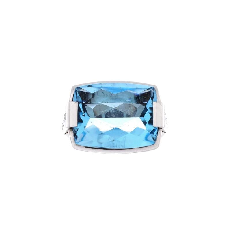 Bvlgari Metropolis Ring 18K White Gold and Blue Topaz: Measurements Size 5 Width 305 mm Condition Preowned GoodBrand BvlgariMain Stone TopazMetal 18K White GoldMetal Purity 18KRing Size 5Type RingColor White GoldStyle 18K White Gold And Blue