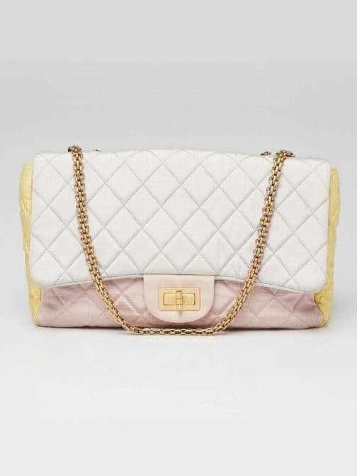Chanel Tricolor Reissue 255 Quilted Canvas 227 Jumbo Flap Bag: Handle Drop 11 and 19 Measurements 1225 L x 35 W x 8 H Condition Preowned GoodBrand ChanelExterior Material CanvasStyle Crossbody BagsEveryday BagsExterior Color MulticolorDepartment WomenCountry of