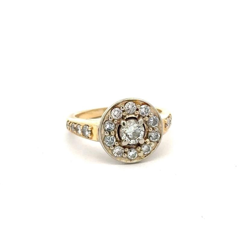 Vintage Halo Diamond Ring In 14K TwoTone Gold: Condition Preowned GoodMain Stone Creation NaturalShape RoundSizable YesMain Stone Color WhiteColorlessMetal Yellow GoldTotal Carat Weight 098Main Stone DiamondVintage YesBrand UnbrandedSetting