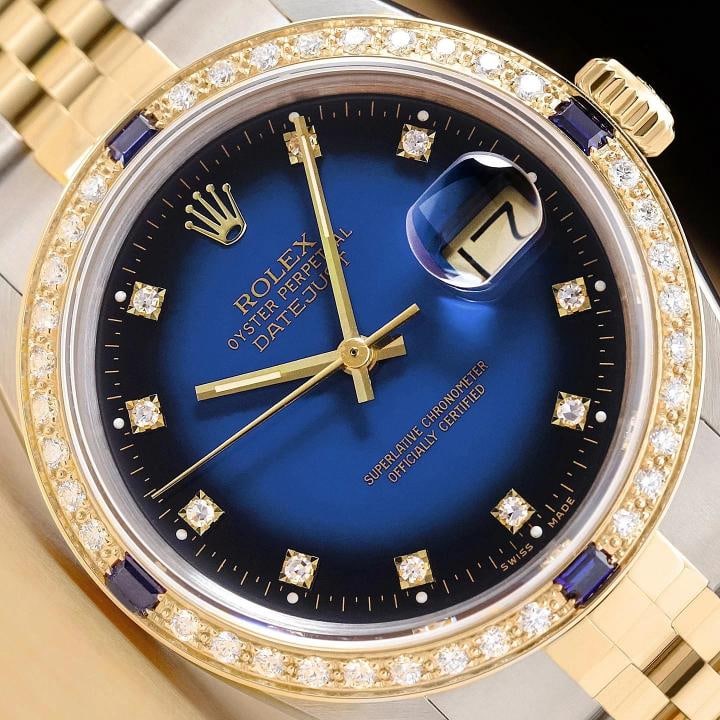 ROLEX DATEJUST 16233 BLUE VIGNETTE FACTORY DIAMOND SAPPHIRE 18K GOLD STEEL WATCH: This is an authentic Rolex Datejust 16233 watch with two tone 18K yellow gold and stainless steel jubilee bracelet factory Rolex diamond dial Ref and custom 18K yellow gold sapphire diamond bezel Desc