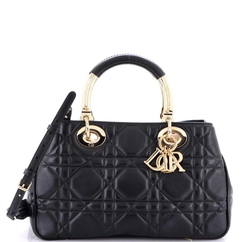 Christian Dior Lady 9522 Bag Cannage Embossed Leather Medium: Accessories Dust Bag With Strap Measurements Height 7 Width 115 Depth 5 Condition Preowned ExcellentBrand Christian DiorExterior Material LeatherStyle TotesExterior Color BlackDepartment WomenSize