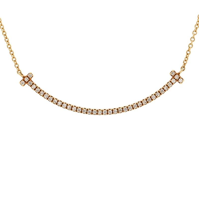 Tiffany Co T Smile Pendant Necklace 18K Yellow Gold and Diamonds Small: Condition Preowned GoodBrand Tiffany CoMain Stone DiamondMetal 18K Yellow GoldMetal Purity 18KStyle PendantType NecklaceColor Yellow GoldMaterial 18K Yellow Gold Condition Great Minor wear
