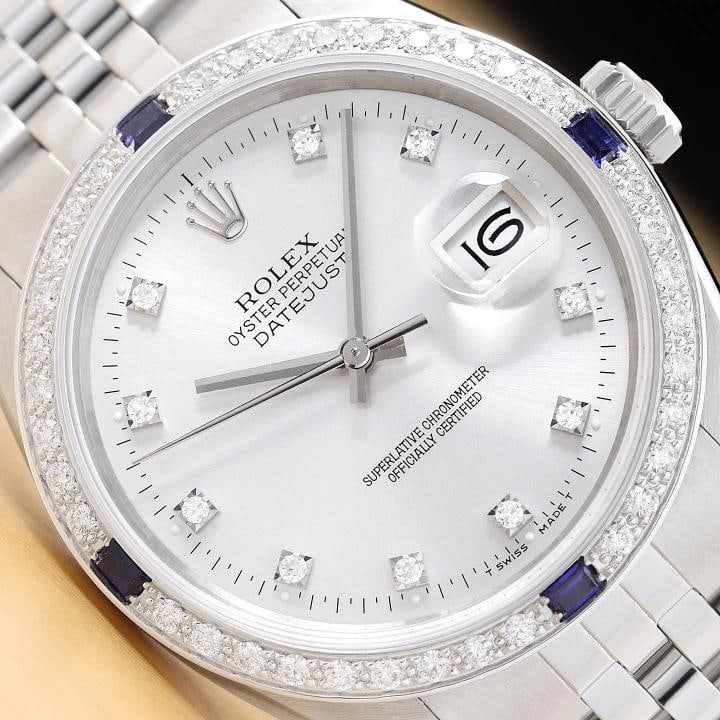 MENS ROLEX DATEJUST 16234 SILVER FACTORY DIAMOND SAPPHIRE 18K GOLD STEEL WATCH: This is an authentic Rolex Datejust 16234 watch with factory Rolex diamond dial Rolex stainless steel jubilee bracelet and custom 18K white gold sapphire diamond bezelDescriptions Brand Rolex Model Da