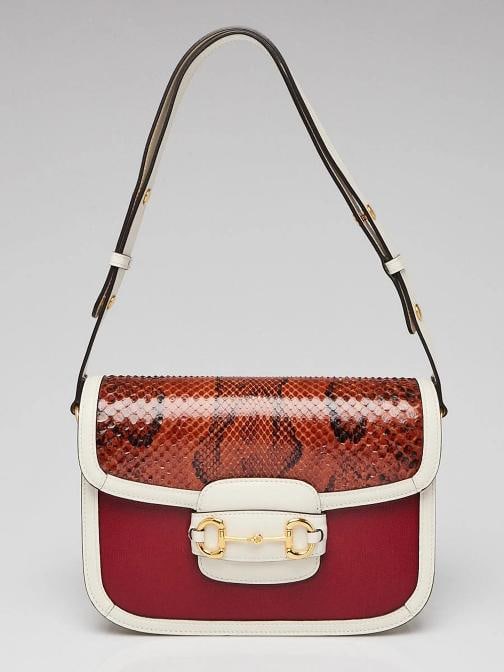 Gucci OrangeRedWhite SnakeskinLeather 1955 Horsebit Shoulder Bag: Handle Drop 95 and 17 Measurements 10 L x 3 W x 75 H Condition Preowned GoodBrand GucciExterior Material LeatherSnakeskinStyle Everyday BagsExterior Color RedWhiteOrangeDepartment WomenCountry of