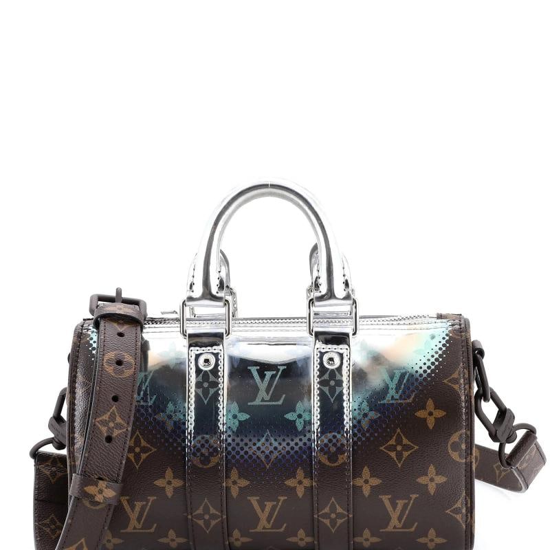 Louis Vuitton Keepall Bandouliere Bag Limited Edition Metallic Nebula Monogram: Accessories Dust Bag Luggage Tag With Strap Measurements Handle Drop 3 Height 55 Width 10 Depth 4 Strap Drop 23 Condition Preowned GoodBrand Louis VuittonExterior Material Canvas CoatedStyle Top