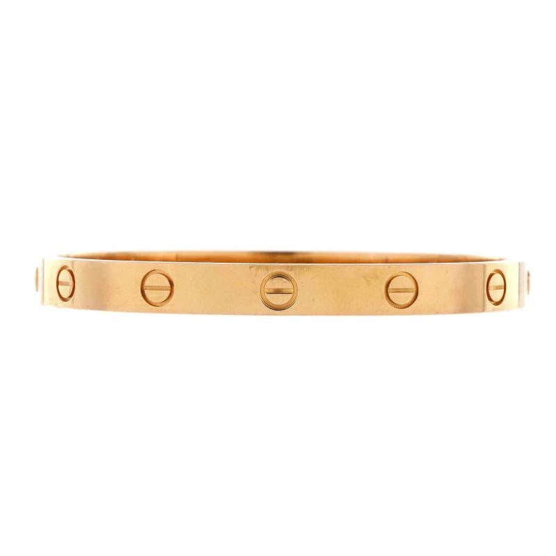 Cartier Love Bracelet 18K Rose Gold: Accessories Pochette Clochette Keys Lock With Strap Measurements Handle Drop 3 Height 10 Width 12 Depth 4 Strap Drop 185 Condition Preowned GoodBrand CartierMain Stone UnknownMetal 18K Rose GoldMetal