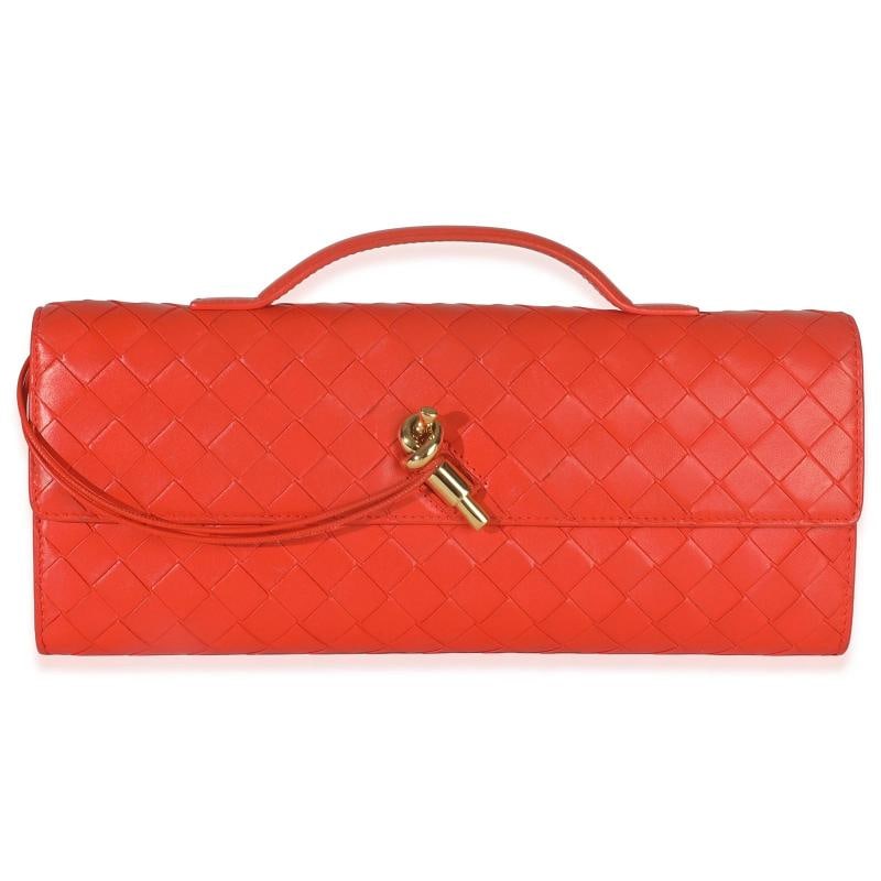 Bottega Veneta Cherry Tomato Nappa Intrecciato Long Andiamo Top Handle Clutch: Condition Preowned GoodCountry of Origin ItalyDimensions 12 x 5 x 1Handbag Accessories DustbagCare BookletBag Width 12 inBag Depth 1 inBag Height 5 inDepartment UnisexStyle ClutchExterior Material