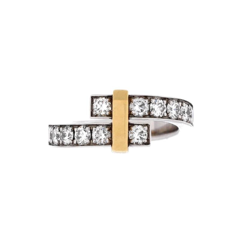 Tiffany Co Edge Bypass Ring Platinum and 18K Yellow Gold with Diamonds Wide: Measurements Size 575 51 Width 365 mm Condition Preowned GoodBrand Tiffany CoMain Stone UnknownMetal 18K Yellow GoldMetal Purity UnknownRing Size 575 51Type RingColor SilverStyle Platinum And